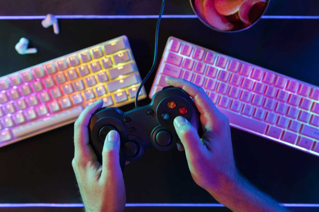 top view hands holding controller